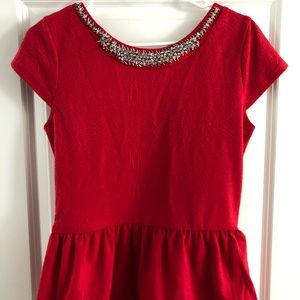 Francesca’s red beaded peplum tip